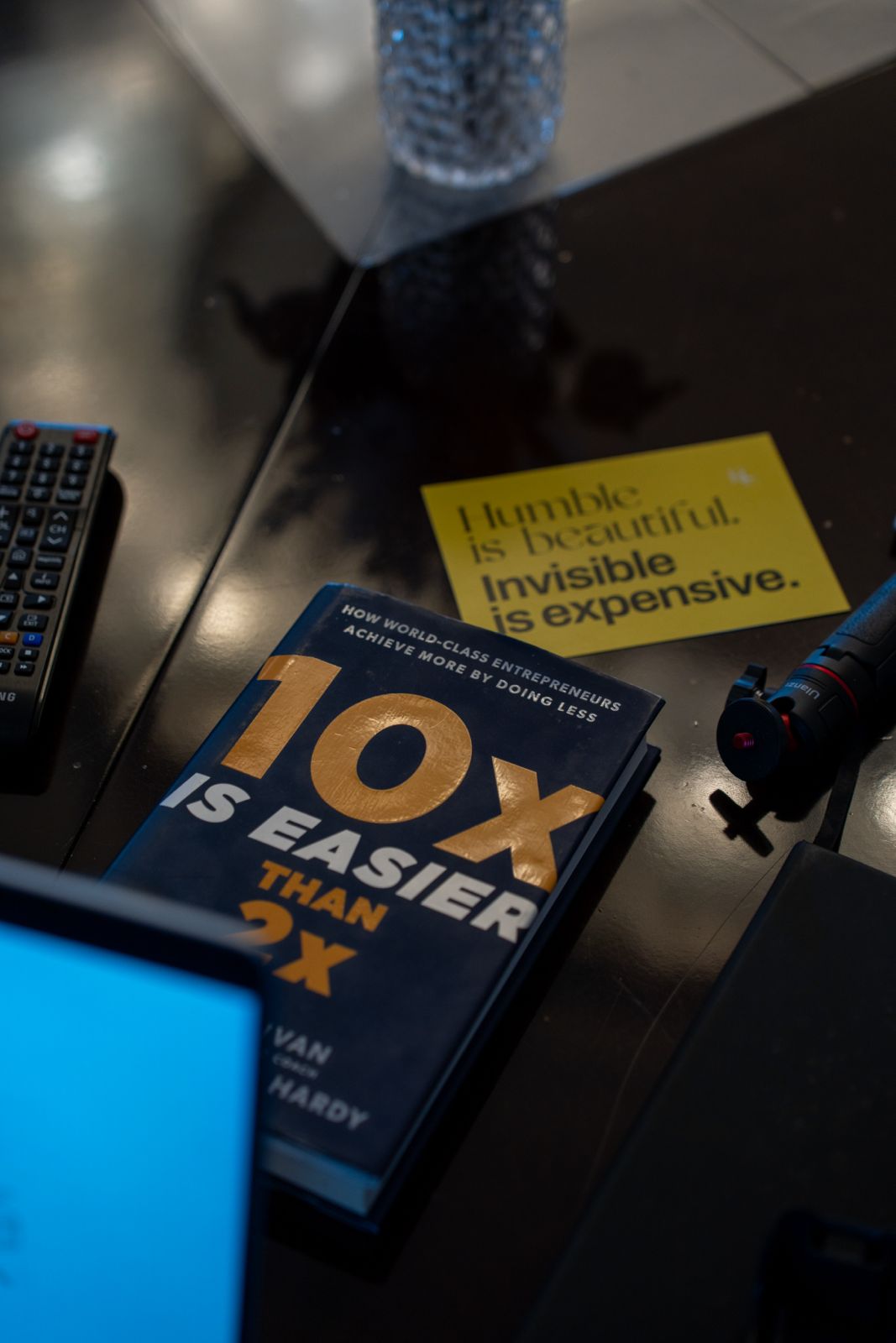 10X Is Easier Than 2X book on a table with a quote card